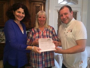 Diana Johnson MP,and Cllr Rosie Nicola receive our petition from Danny Norton of Hull and East Riding Labour LGBT+ Network