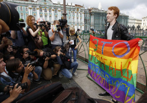 Gay rights activist Kirill Kalugin poses for press during a one-man protest in St. Petersburg